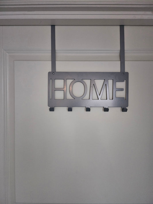 Dørhenger HOME i stål 30 x 33 cm - svart eller grå